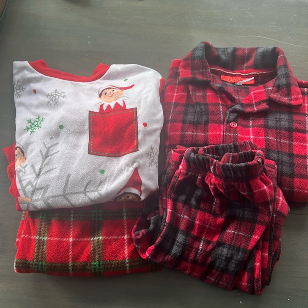 Two sets of warm fuzzy two piece Xmas Jammie’s. Elf on the shelf and plaid.